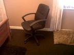 Black Office Chair,  Black ( leather look ) swivel and...